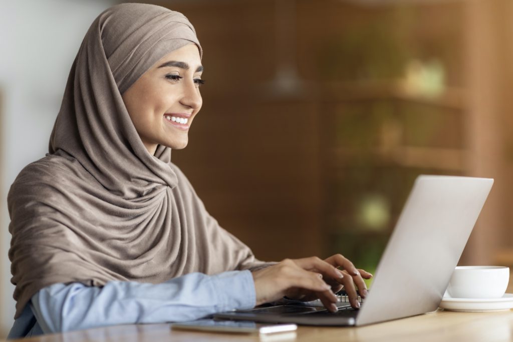 happy woman improving website copy